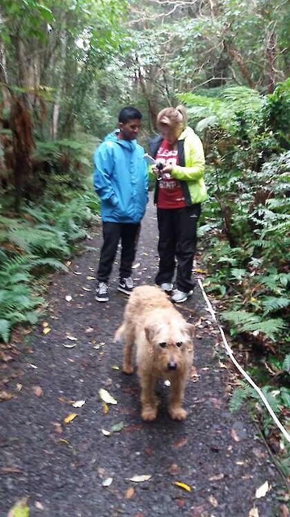 Tshering with Lokesh and BHMET volunteer Billy the dog.